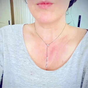 Silver tie collar necklace. Beautiful condition.  So elegant. Shiny.